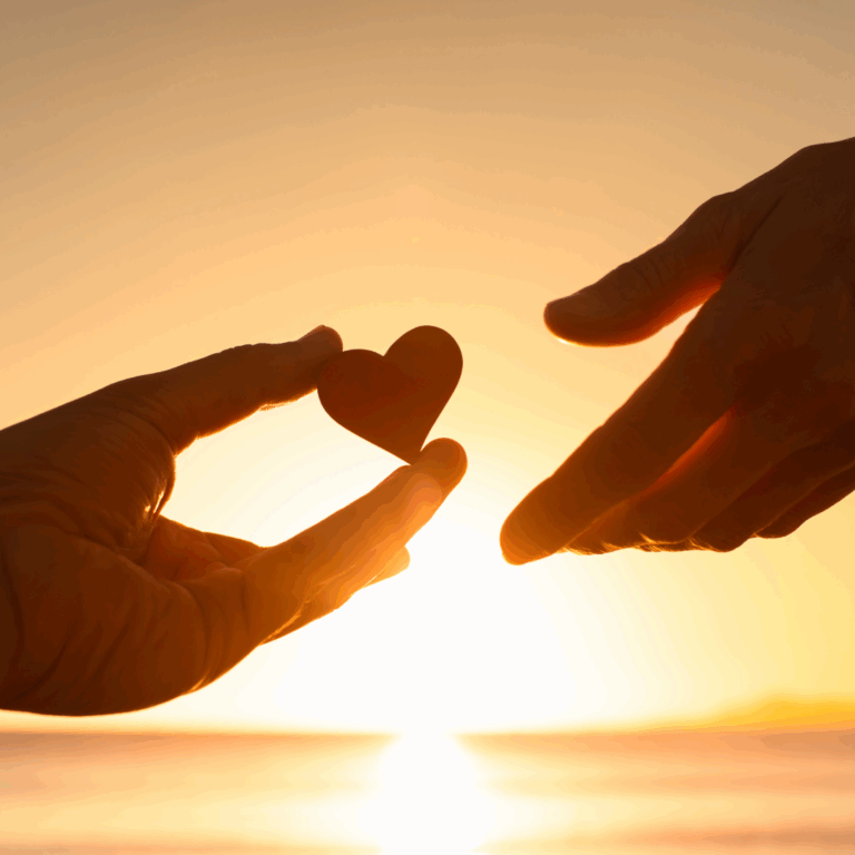 Two hands holding a heart.