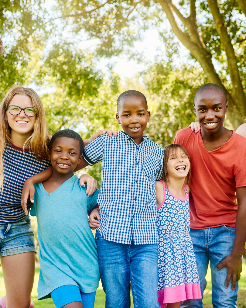 Group of youth smiling.